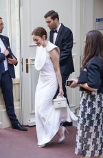 EMMA STONE and Dave McCary Heading to a Red Carpet Event in Cannes 05/16/2025