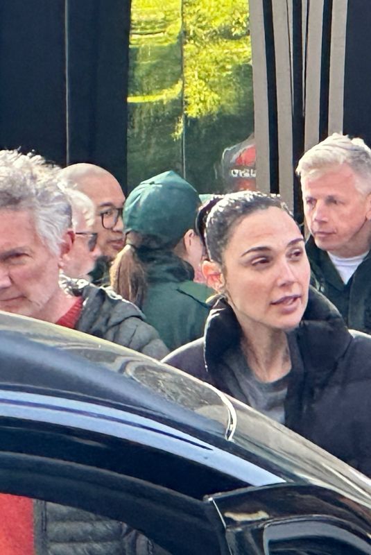 GAL GADOT and Alfred Enoch on the Set of The Runner in Canary Wharf in London 05/09/2025