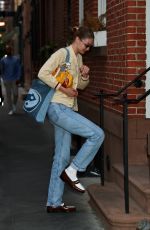 GIGI HADID Heading to a Friend