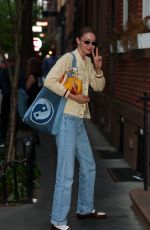 GIGI HADID Heading to a Friend