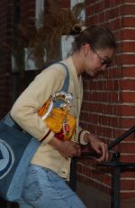 GIGI HADID Heading to a Friend