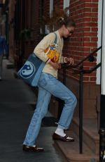 GIGI HADID Heading to a Friend