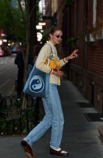 GIGI HADID Heading to a Friend
