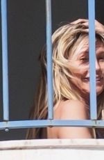 HAIDI KLUM in Bikini on the Balcony of Martinez Hotel in Cannes 05/11/2025