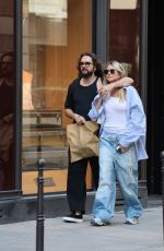 HEIDI KLUM and Tom Kaulitz Enjoyed a Spritz on Terrace of a Parisian Cafe 05/19/2025