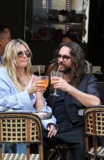 HEIDI KLUM and Tom Kaulitz Enjoyed a Spritz on Terrace of a Parisian Cafe 05/19/2025