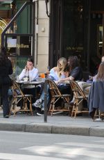 HEIDI KLUM and Tom Kaulitz Enjoyed a Spritz on Terrace of a Parisian Cafe 05/19/2025