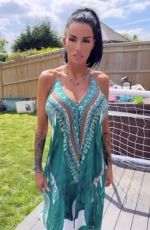 KATIE PRICE Models Her New Maxi Dress from JYY London Brand Collection 05/26/2025
