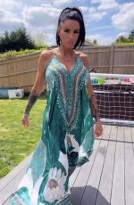 KATIE PRICE Models Her New Maxi Dress from JYY London Brand Collection 05/26/2025