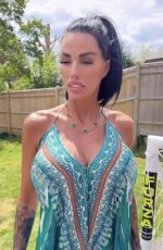 KATIE PRICE Models Her New Maxi Dress from JYY London Brand Collection 05/26/2025