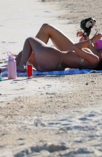 KYLIE JENNER in a Gold Bikini on Holiday in Turks and Caicos 05/11/2025