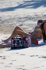 KYLIE JENNER in a Gold Bikini on Holiday in Turks and Caicos 05/11/2025