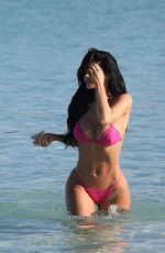 KYLIE JENNER in a Neon Pink Bikini on the Beach in Turks and Caicos 05/10/2025