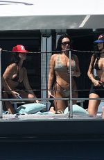 KYLIE JENNER in Bikini on Yacht at F1 Weekend with Hailey Bieber and Friends in Miami 05/02/2025