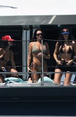 KYLIE JENNER in Bikini on Yacht at F1 Weekend with Hailey Bieber and Friends in Miami 05/02/2025