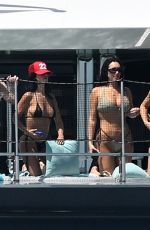 KYLIE JENNER in Bikini on Yacht at F1 Weekend with Hailey Bieber and Friends in Miami 05/02/2025