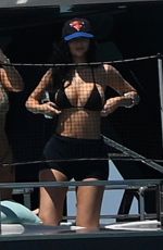 KYLIE JENNER in Bikini on Yacht at F1 Weekend with Hailey Bieber and Friends in Miami 05/02/2025