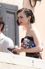 LILY COLLIN Shoots a Romantic Scene with Eugenio Franceschini on the Set of Emily in Paris 05/19/2025