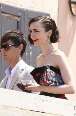LILY COLLIN Shoots a Romantic Scene with Eugenio Franceschini on the Set of Emily in Paris 05/19/2025