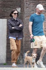 LILY COLLINS and Charlie McDowell Out with Their Dog at Villa Borghese Park in Rome 05/10/2025