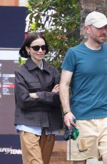 LILY COLLINS and Charlie McDowell Out with Their Dog at Villa Borghese Park in Rome 05/10/2025