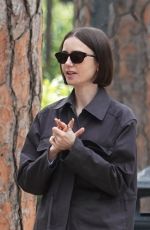 LILY COLLINS and Charlie McDowell Out with Their Dog at Villa Borghese Park in Rome 05/10/2025