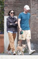 LILY COLLINS and Charlie McDowell Out with Their Dog at Villa Borghese Park in Rome 05/10/2025