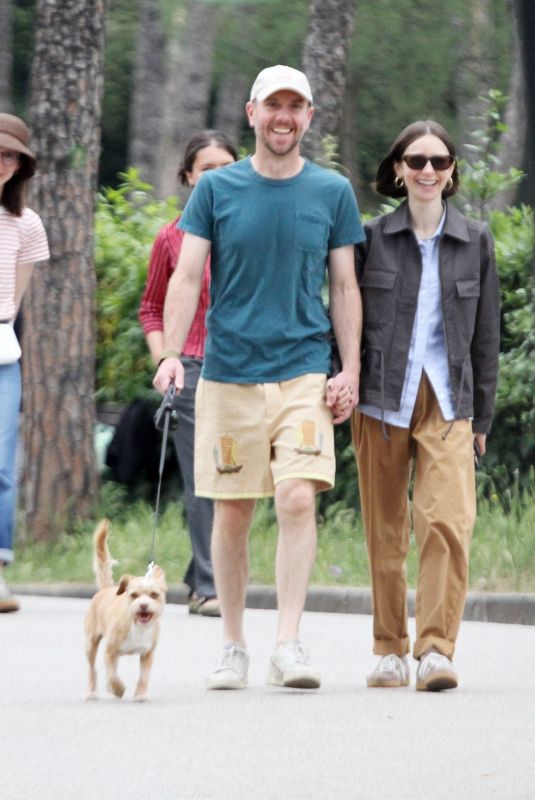 LILY COLLINS and Charlie McDowell Out with Their Dog at Villa Borghese Park in Rome 05/10/2025