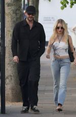 LOTTIE MOSS Spends Afternoon with a Mystery Man in Bayswater 04/29/2025