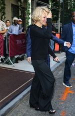 PAMELA ANDERSON Leaves Her Hotel in New York City 05/19/2025