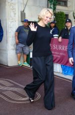 PAMELA ANDERSON Leaves Her Hotel in New York City 05/19/2025
