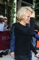 PAMELA ANDERSON Leaves Her Hotel in New York City 05/19/2025