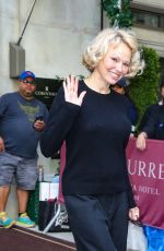 PAMELA ANDERSON Leaves Her Hotel in New York City 05/19/2025
