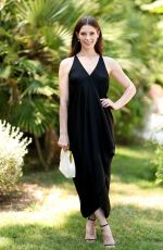 ASHLEY GREENE at a Filming Italy 2025 Photocall in Santa Margherita di Pula 06/21/2025