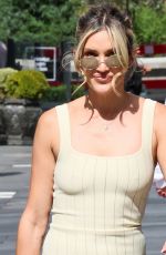 ASHLEY ROBERTS in a Striped Cream Dress Arrives at Heart Radio in London 06/23/2025