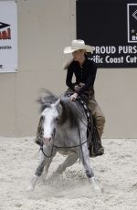 BELLA HADID Practices to Compete in Horse Cutting Championship in Las Vegas 06/15/2025