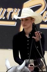 BELLA HADID Practices to Compete in Horse Cutting Championship in Las Vegas 06/15/2025