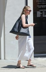 DAKOTA FANNING Visits a Hair Salon in Los Angeles 06/16/2025