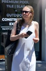 DAKOTA FANNING Visits a Hair Salon in Los Angeles 06/16/2025