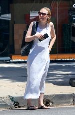 DAKOTA FANNING Visits a Hair Salon in Los Angeles 06/16/2025