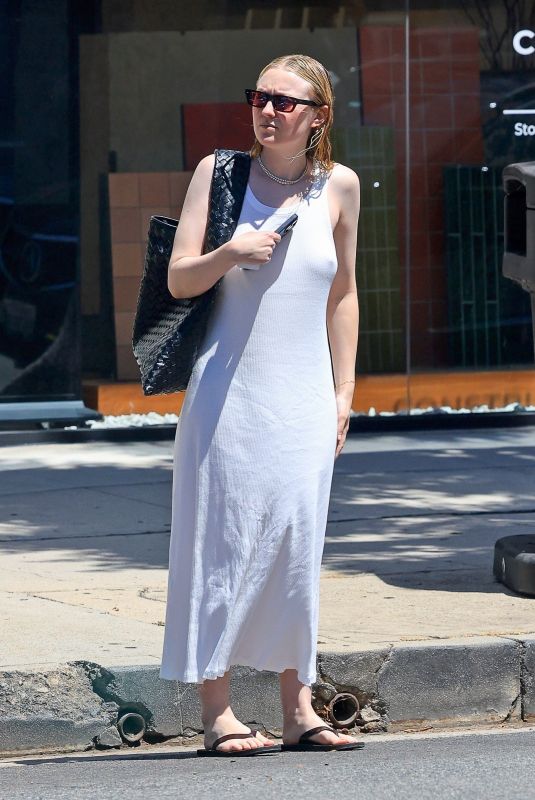 DAKOTA FANNING Visits a Hair Salon in Los Angeles 06/16/2025