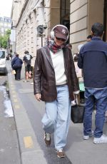 EMMA WATSON Out in a Brown Leather Jacket and Jeans in Paris 06/08/2025
