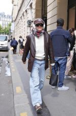 EMMA WATSON Out in a Brown Leather Jacket and Jeans in Paris 06/08/2025