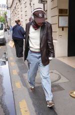 EMMA WATSON Out in a Brown Leather Jacket and Jeans in Paris 06/08/2025