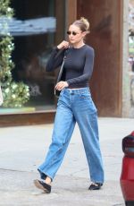 GIGI HADID Out and About in New York City 06/12/2025
