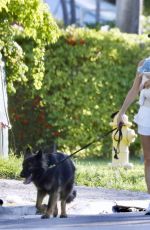 GISELE BUNDCHEN Out on a Dog Walk in Miami 06/17/2025