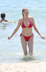 HEATHER GRAHAM in a Red Bikini at a Beach in Sardinia 06/20/2025