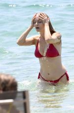 HEATHER GRAHAM in a Red Bikini at a Beach in Sardinia 06/20/2025
