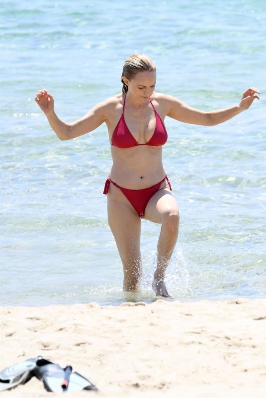 HEATHER GRAHAM in a Red Bikini at a Beach in Sardinia 06/20/2025