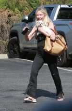 HEATHER LOCKLEAR Out Shopping with Her Dog at Erewhon 06/25/2025
